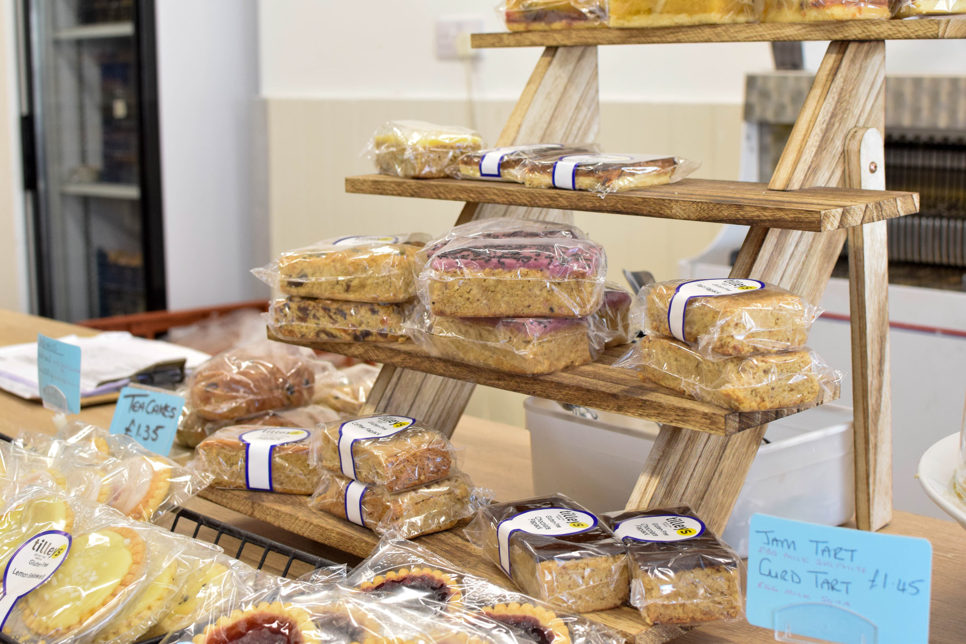 Wrapped gluten free flapjacks, slices and tarts on display